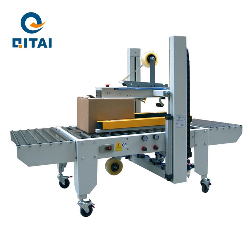 AUTOMATIC TOP AND SIDE BELT DRIVEN CASE SEALER QT-50EP